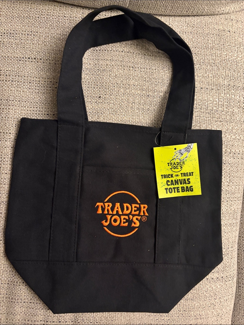 Trader Joe's Trick or Treat Black Canvas Tote Bag with Orange Logo